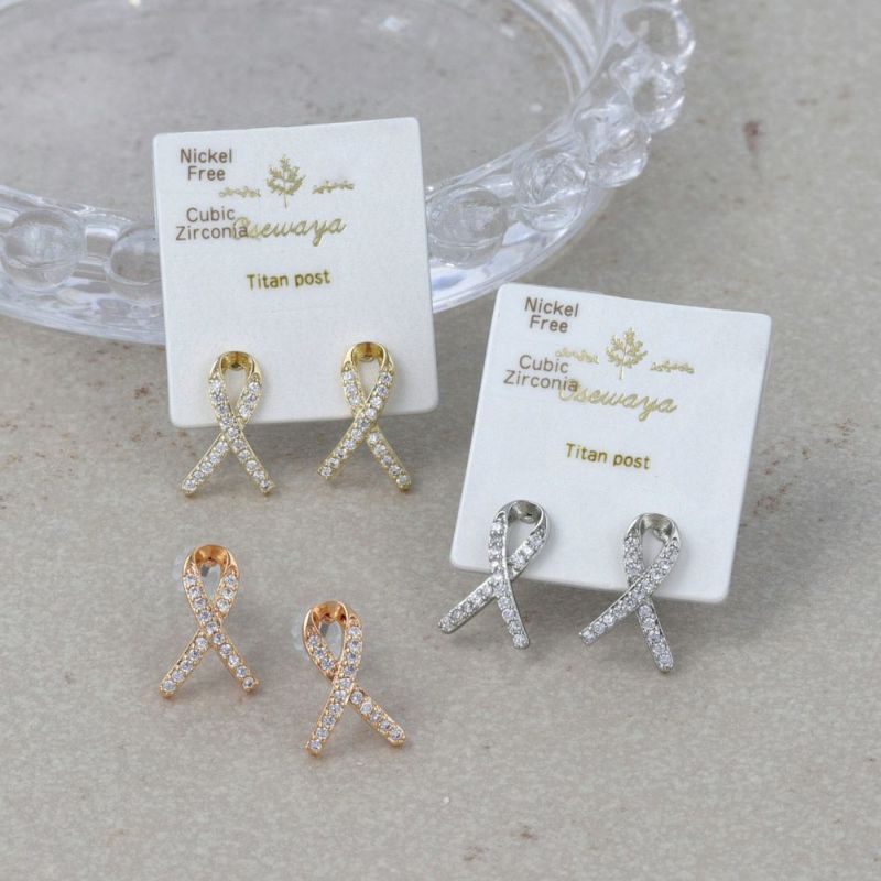 ピアス ニッケルフリー キュービックジルコニア ロール クロス リボン